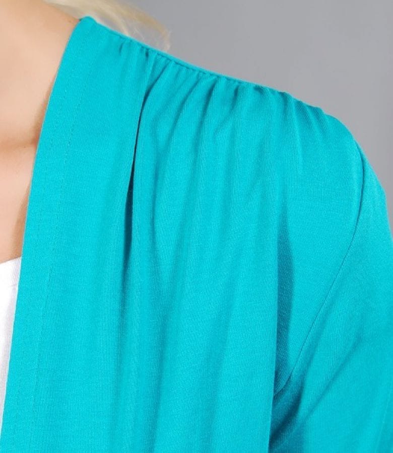 Bluza din jerse turquoise legata cu cordon