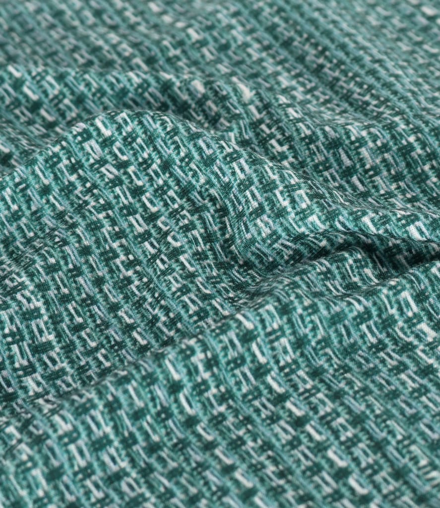 Bluza din jerse elastic imprimat cu motive geometrice