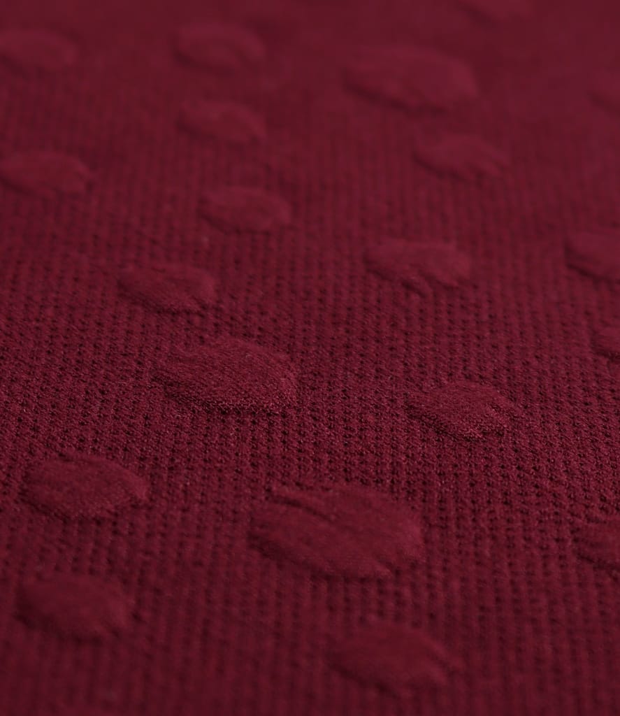 Rochie eleganta din jerse elastic gros cu buline tesute in relief