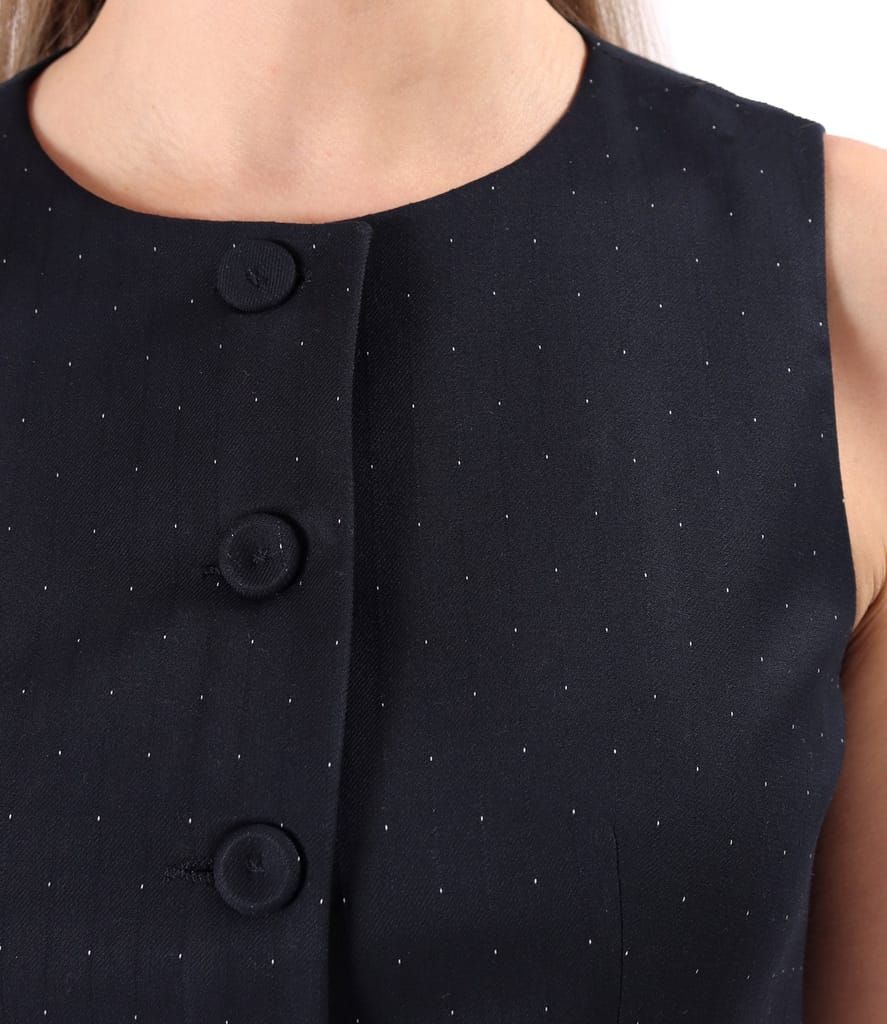 Vesta eleganta cu peplum din stofa cu picouri