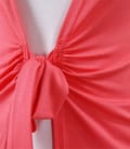 Bluza din jerse roz legata cu cordon